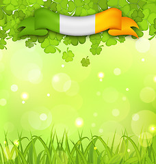 Image showing Glowing nature background with shamrocks, grass and Irish flag f