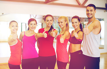 Image showing group of people in the gym showing thumbs up