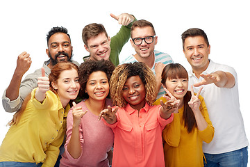 Image showing international group of people showing thumbs up