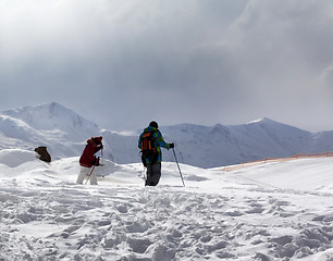 Image showing Father and daughter on ski resort after snowfall at sun day with