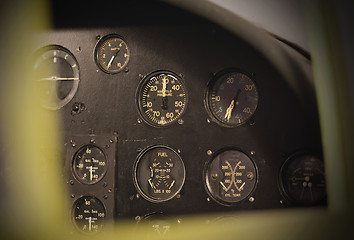 Image showing Different meters and displays in an old plane