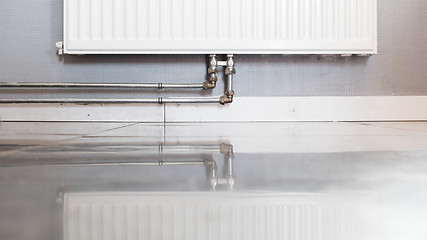 Image showing Heating radiator with reflection