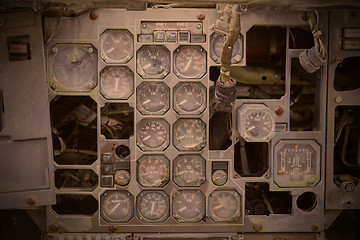 Image showing Different meters and displays in an old plane