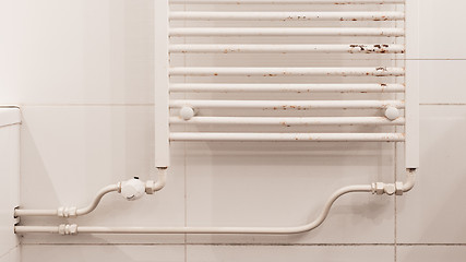Image showing Rusty household cast iron radiator