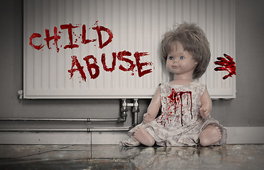 Image showing Concept of child abuse - Bloody doll