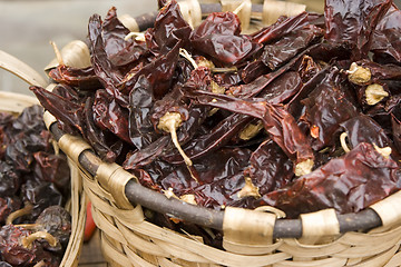 Image showing red hot chilli peppers in a basket