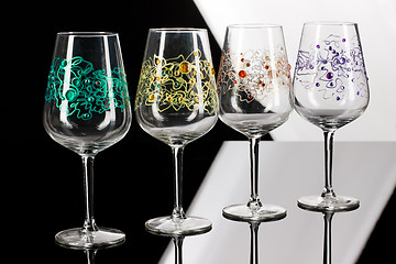 Image showing Wineglasses On Glass Background