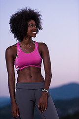 Image showing portrait of african american woman jogging in nature