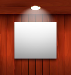 Image showing Empty frame on wooden wall lamp illuminated