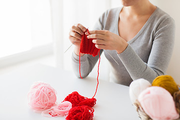 Image showing woman hands knitting with needles and yarn