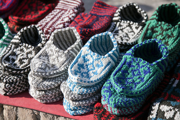 Image showing Knitted slippers in a street market, Uzbekistan