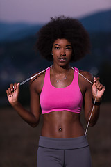 Image showing portrait of african american woman jogging in nature