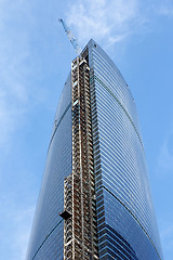 Image showing Modern buildings of glass and steel skyscrapers against the sky