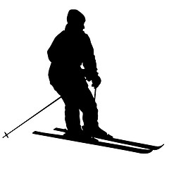 Image showing Mountain skier speeding down slope. sport silhouette