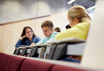 Image showing group of students with notebooks at lecture hall