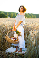 Image showing beautiful woman in trendy summer dress in field