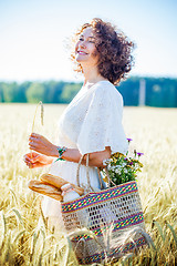 Image showing beautiful middle aged woman with bag
