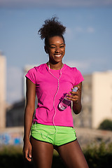 Image showing african american woman running outdoors