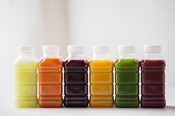 Image showing bottles with different fruit or vegetable juices