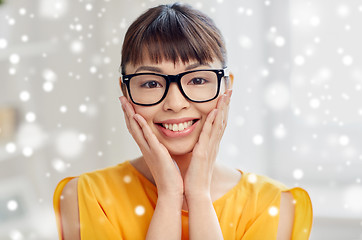 Image showing happy asian young woman in glasses at home