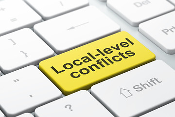 Image showing Political concept: Local-level Conflicts on computer keyboard background