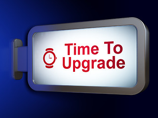 Image showing Time concept: Time To Upgrade and Hand Watch on billboard background