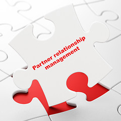 Image showing Finance concept: Partner Relationship Management on puzzle background