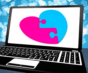 Image showing Puzzle Heart On Laptop Showing Online Dating