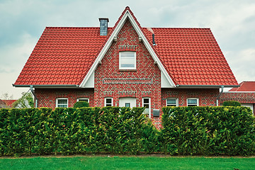 Image showing Two-storey House in Small City