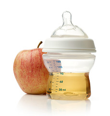 Image showing Apple juice in baby bottle