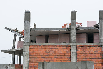 Image showing The collapse of the roof of the house under construction