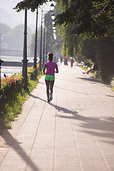 Image showing african american woman jogging in the city