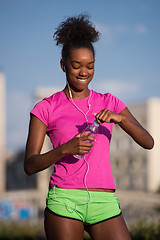 Image showing african american woman running outdoors