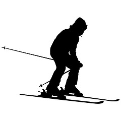 Image showing Mountain skier speeding down slope. sport silhouette