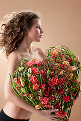 Image showing Young Woman With Flowers