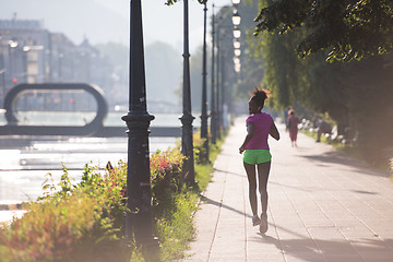 Image showing african american woman jogging in the city