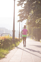 Image showing african american woman jogging in the city