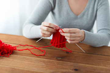 Image showing woman hands knitting with needles and yarn