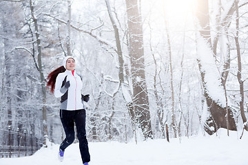 Image showing Sport brunette jogging on morning