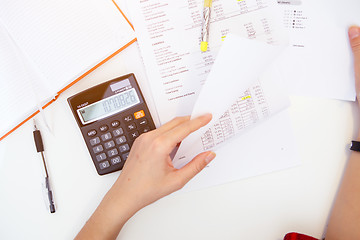 Image showing Accountant working on white table