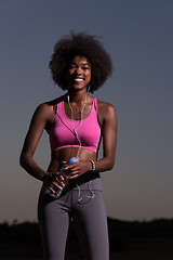 Image showing african american woman jogging in nature