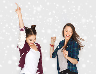 Image showing happy smiling pretty teenage girls dancing