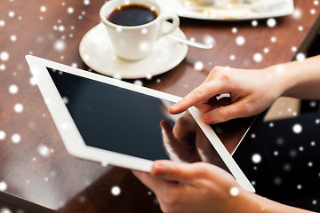 Image showing woman with tablet pc and coffee