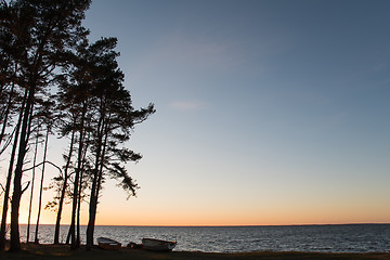 Image showing Evening with rowboats by the sea