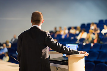 Image showing Public speaker giving talk at business event.