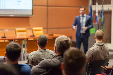 Image showing Business speaker giving a talk in conference hall.