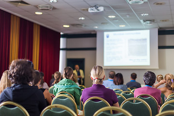 Image showing Audience in lecture hall participating at business conference.