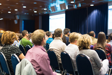 Image showing Audience in lecture hall participating at business event.