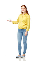 Image showing happy woman holding something imaginary on hand