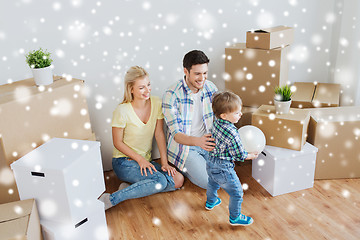 Image showing happy family moving to new home and playing ball